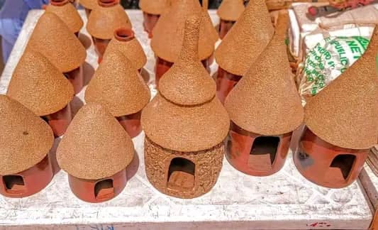 Traditional clay house sculptures